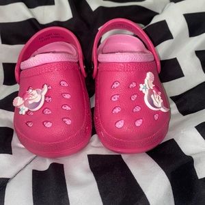 Pink crocs